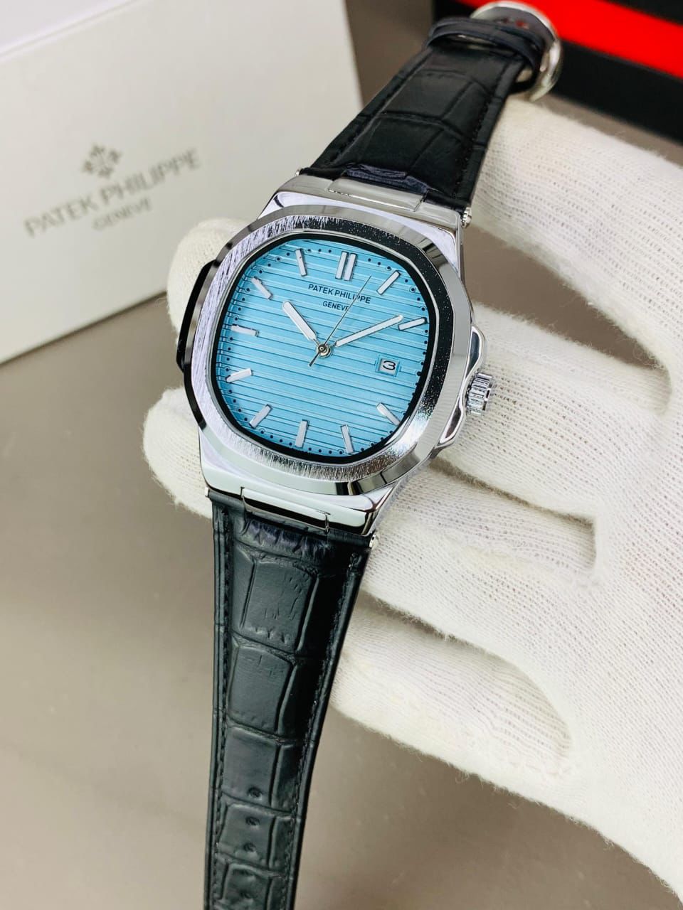 PATEK PHILIPPE GENEVE FAMOUS NATULIS MODEL WITH LEATHER STREP BRASS CASE WITH PATEK MONOGRAM LOCK