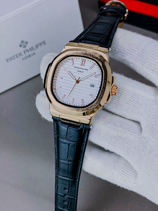 PATEK PHILIPPE GENEVE FAMOUS NATULIS MODEL WITH LEATHER STREP BRASS CASE WITH PATEK MONOGRAM LOCK