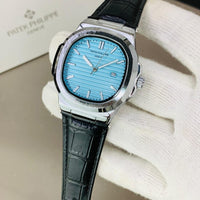 PATEK PHILIPPE GENEVE FAMOUS NATULIS MODEL WITH LEATHER STREP BRASS CASE WITH PATEK MONOGRAM LOCK