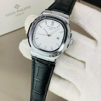 PATEK PHILIPPE GENEVE FAMOUS NATULIS MODEL WITH LEATHER STREP BRASS CASE WITH PATEK MONOGRAM LOCK