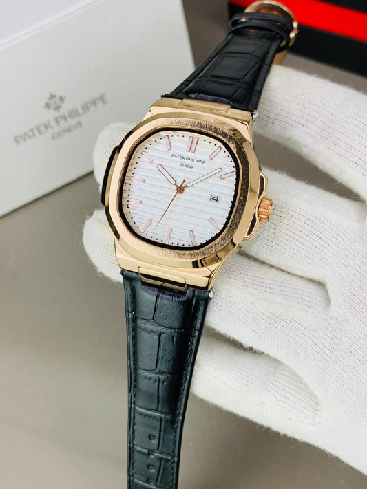 PATEK PHILIPPE GENEVE FAMOUS NATULIS MODEL WITH LEATHER STREP BRASS CASE WITH PATEK MONOGRAM LOCK