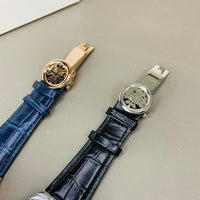 PATEK PHILIPPE GENEVE FAMOUS NATULIS MODEL WITH LEATHER STREP BRASS CASE WITH PATEK MONOGRAM LOCK