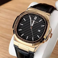 PATEK PHILIPPE GENEVE FAMOUS NATULIS MODEL WITH LEATHER STREP BRASS CASE WITH PATEK MONOGRAM LOCK